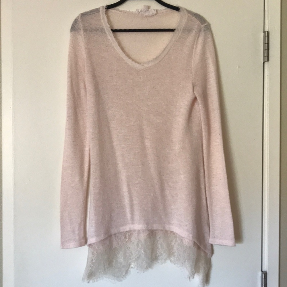 Light pink sweater with lace hem detail